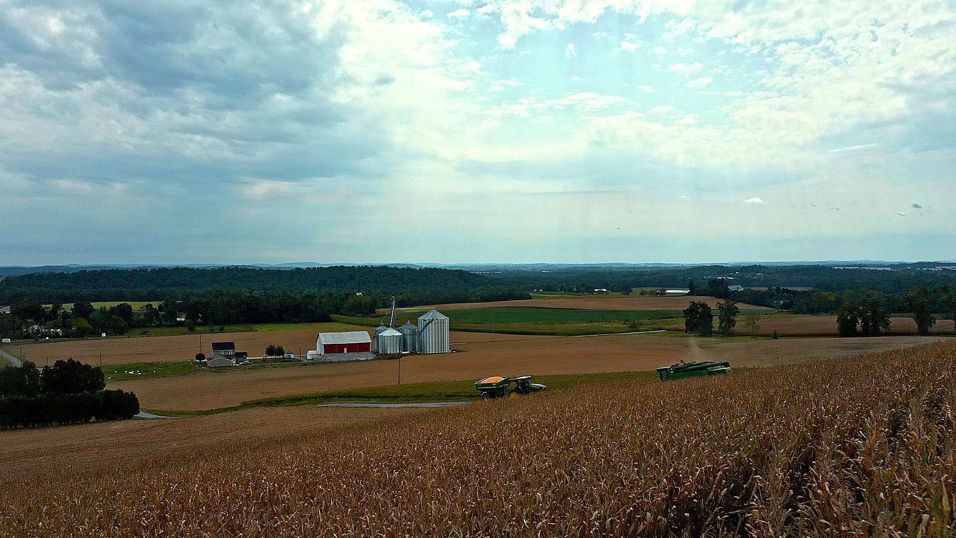 Aerial photo of silos and farming equipment in use on Pennsylvania farm