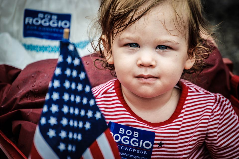Kids in a red wagon, Bob Roggio for Congress