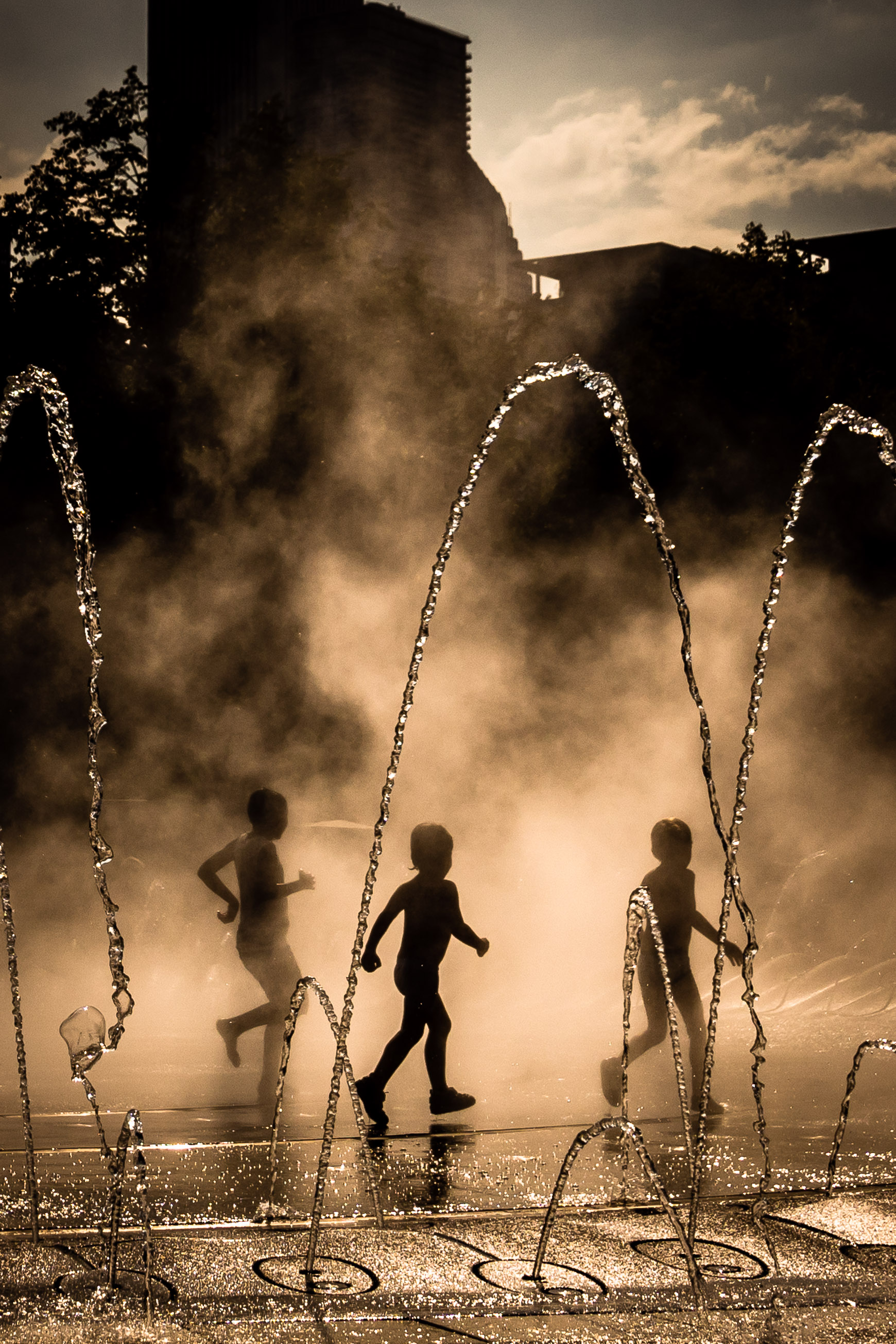 Boys playing in fountain at Navy Pier